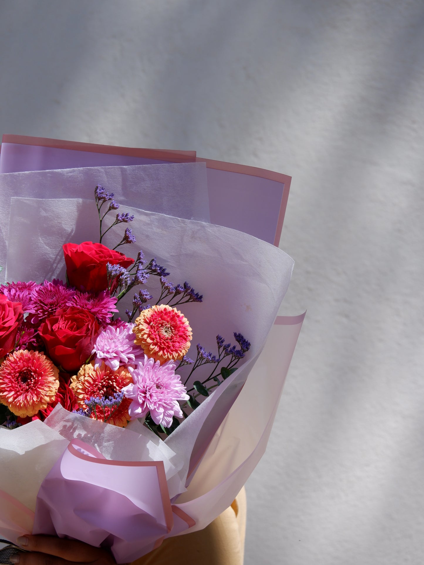Fresh germini with red rose and pink chrysanthemum