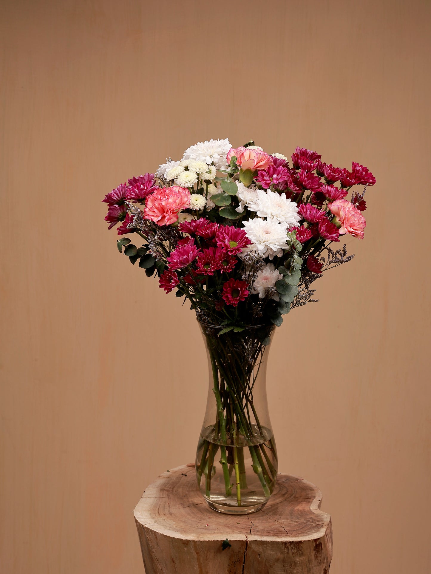 bright flower in glass vase