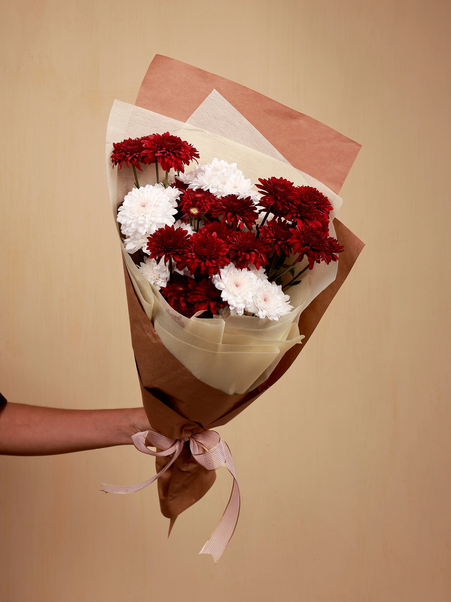 A vibrant bouquet of red and white chrysanthemum