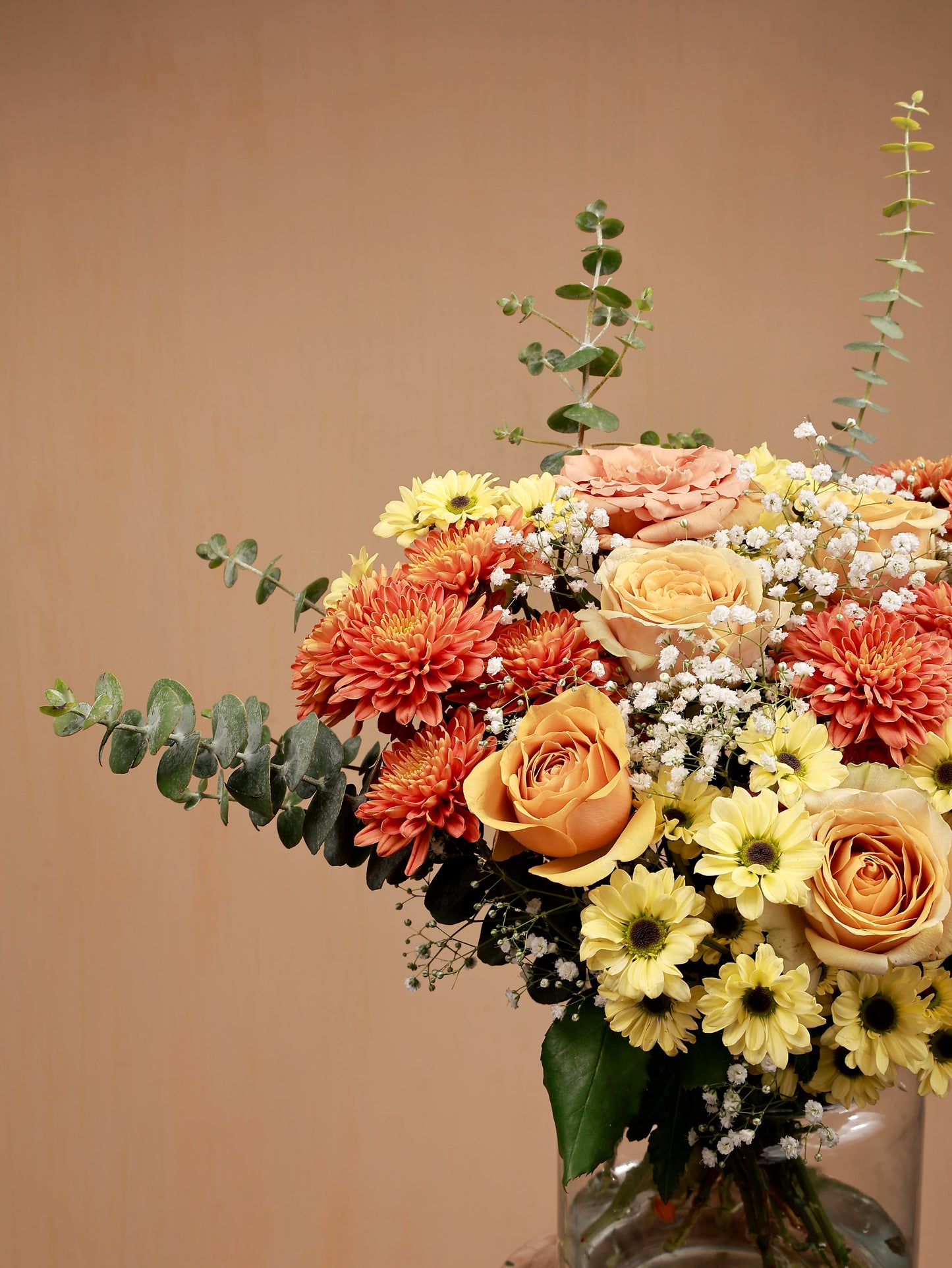 orange and yellow flower bouquet closeup