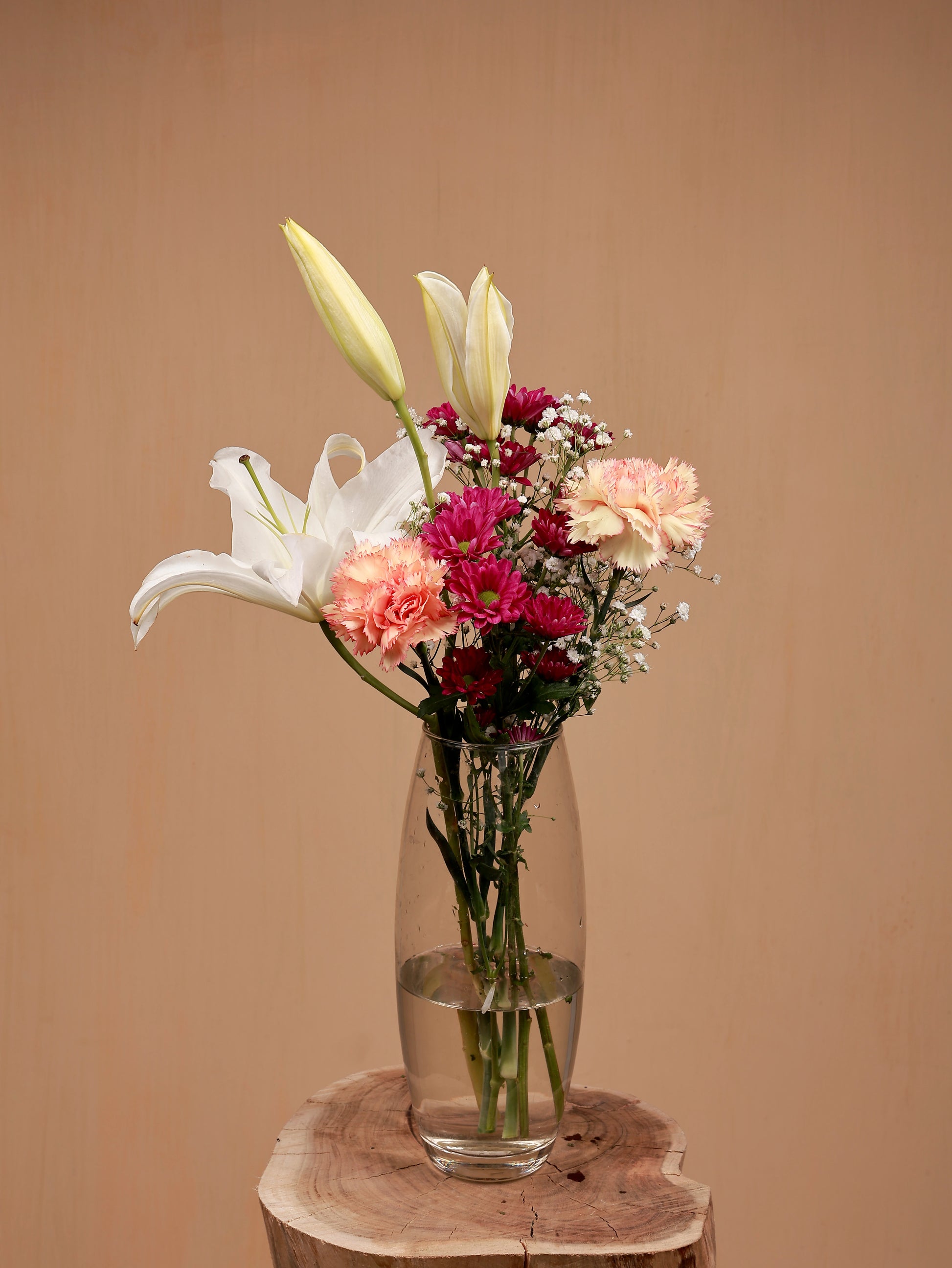 Lily with carnation and santini in glass vase